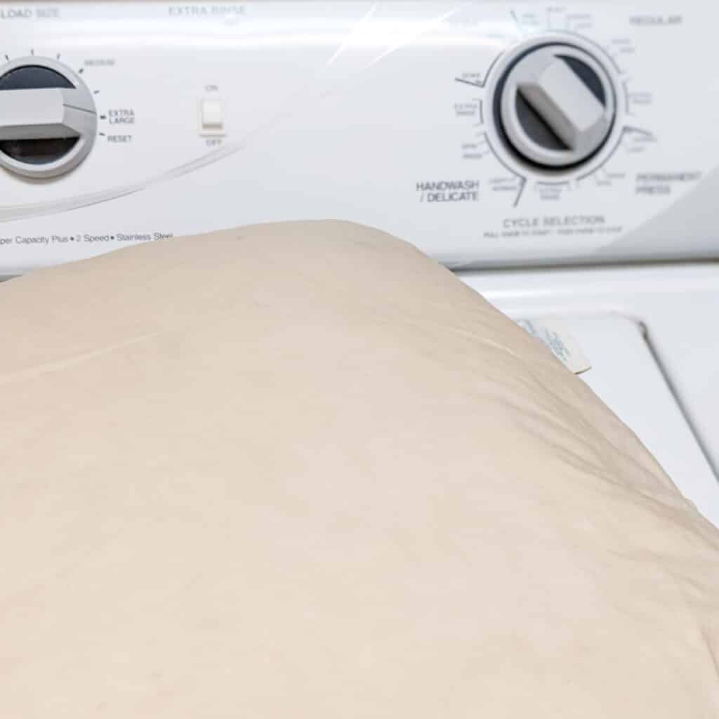 how to machine wash a pillow