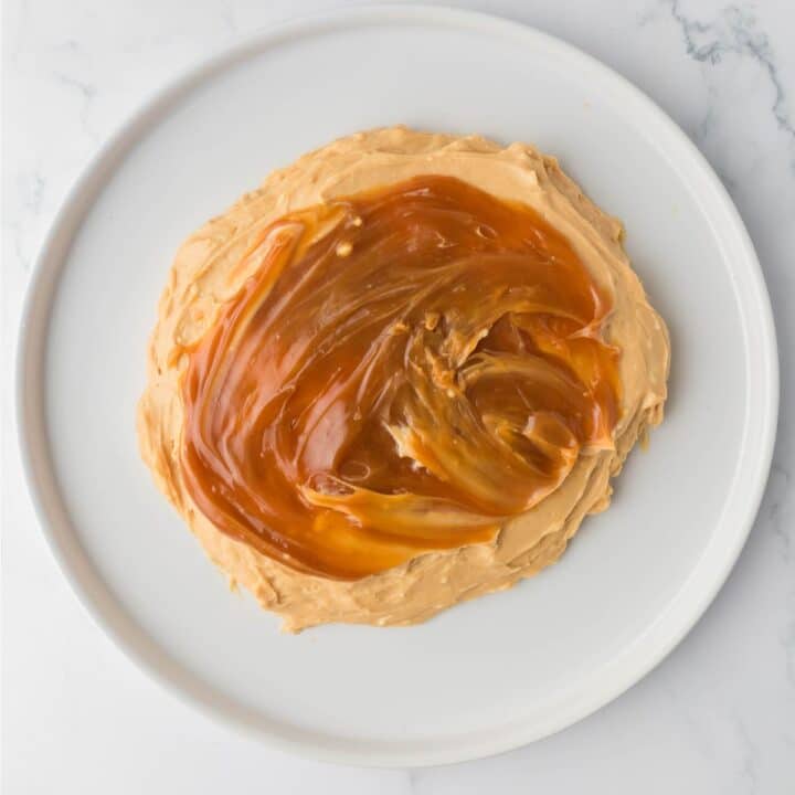 caramel  and cream cheese spread on a plate