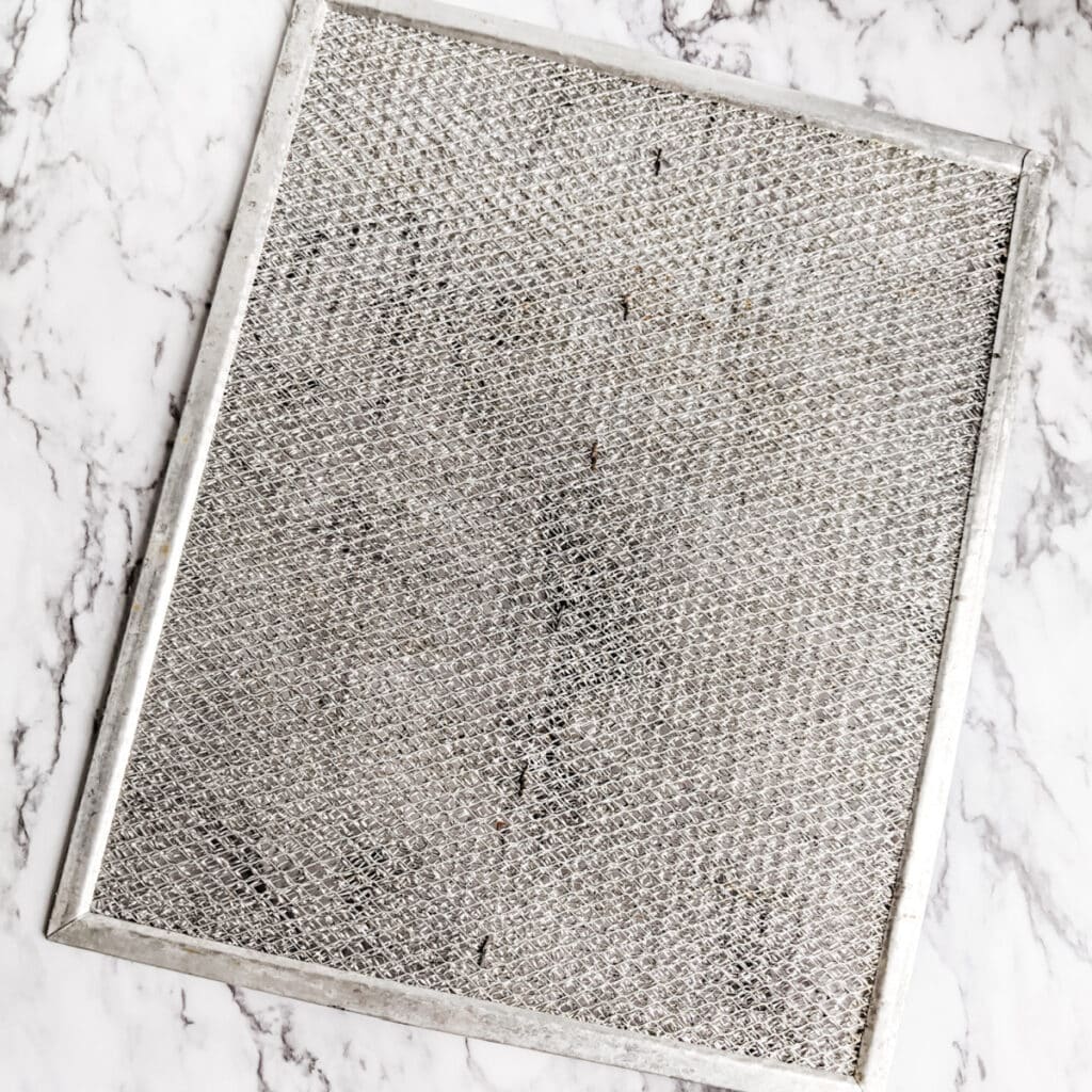 cleaning stove fan filter