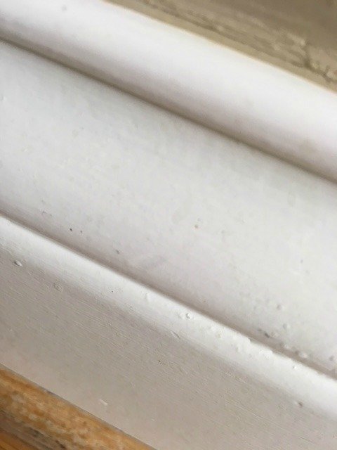 clean baseboards after removing the scuff using a magic eraser