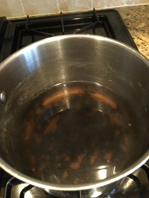 loosened burnt pot