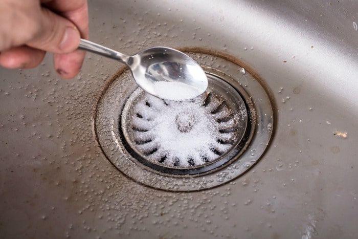 using baking soda to get rid of a smelly sink drain