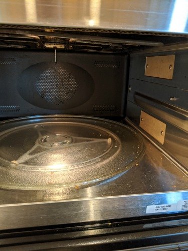 dirty microwave oven before cleaning