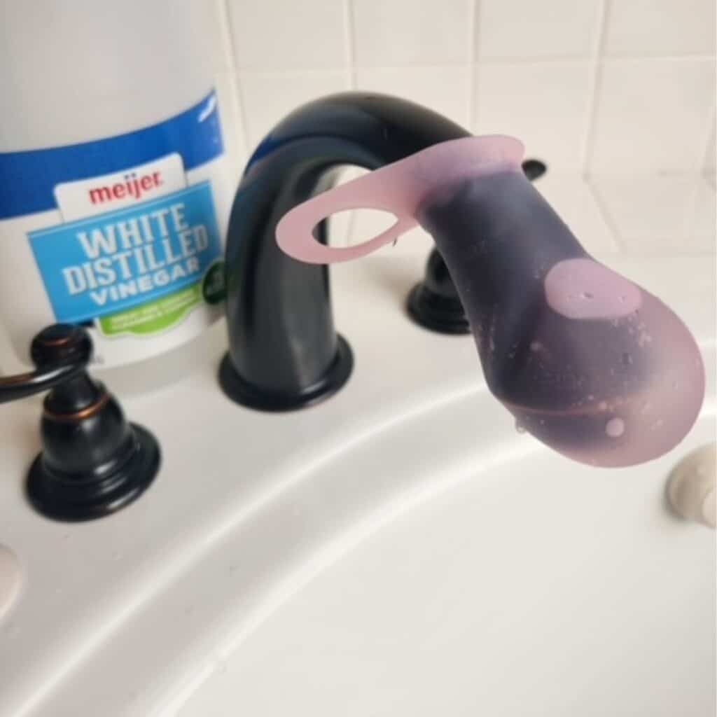 vinegar on faucet with limescale
