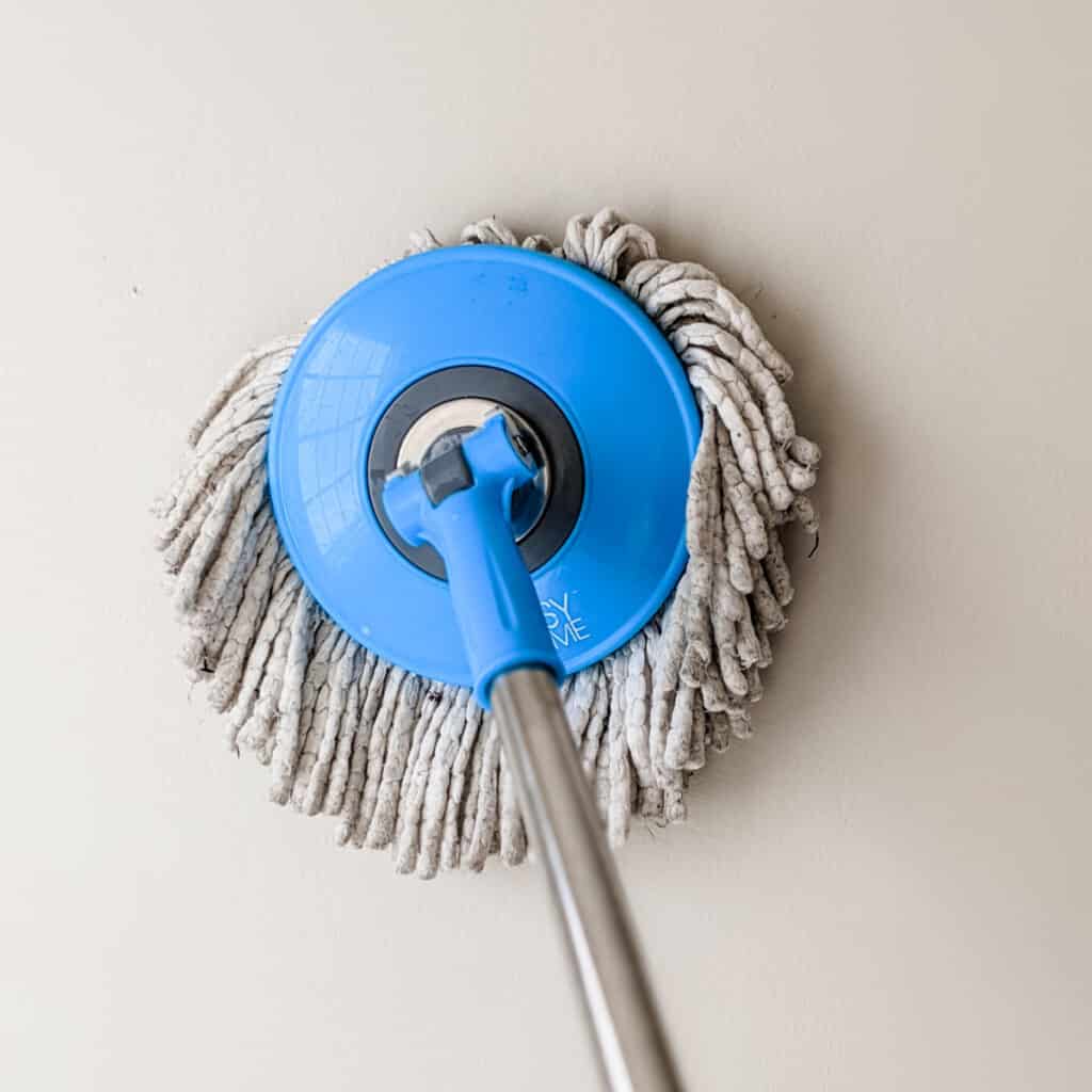 cleaning walls with spin mop