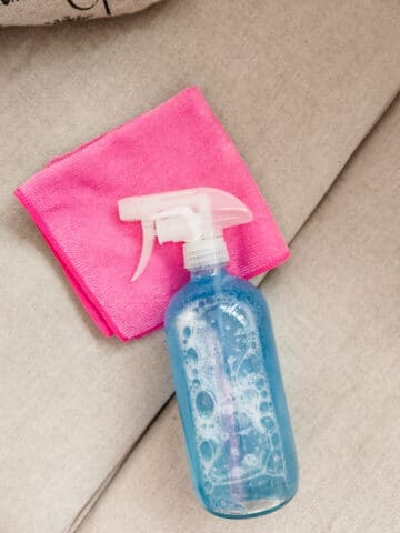 homemade cleaner on couch